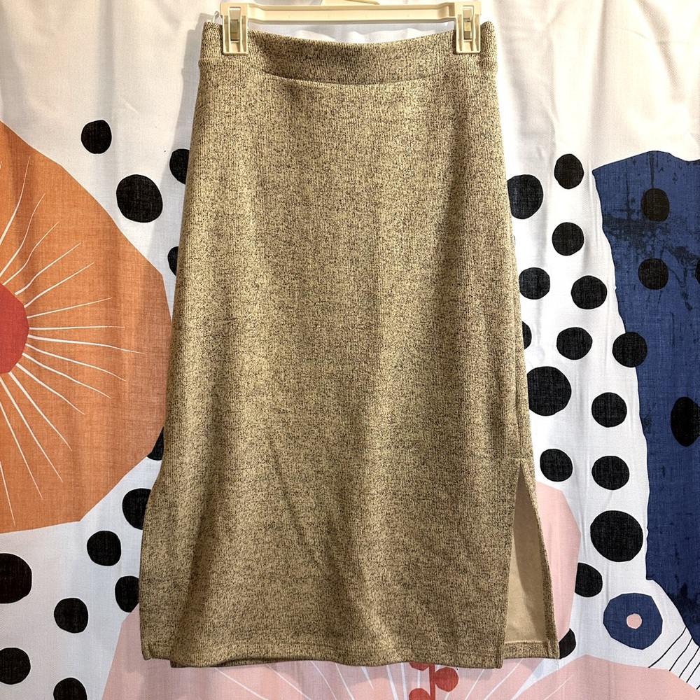Oatmeal colored, winter weight Sade skirt. Size medium.